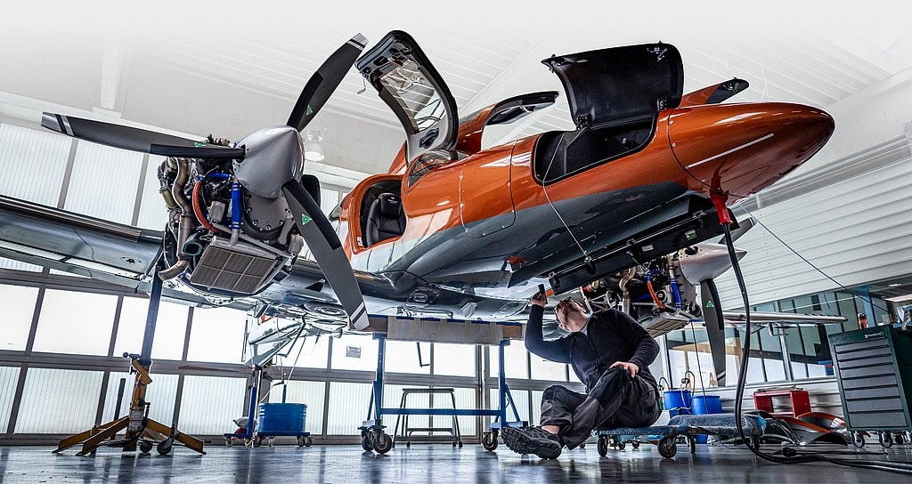 A Diamond DA62 raised on jacks for maintenance